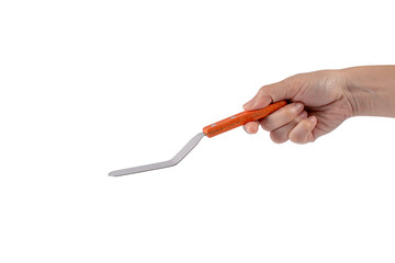 Pastry spatula in hand on transparent background isolation