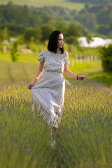 Beautiful woman on lavander field