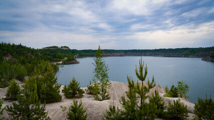 Friendship quarry "Quartz". The combination of the rich turquoise color of the water, rocky shores, and unique white sands that look like mountains create an incredible impression.