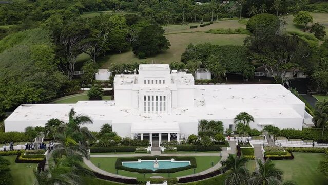 Aerial parallax around large, ornate Laie Hawaii LDS Temple, Oahu, Hawaii.