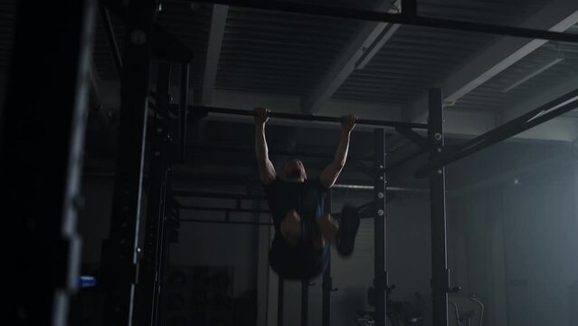 Athletic Gymnast Training On Crossbar, Doing Pull-Ups, Sport And Healthy Lifestyle, Fitness Club