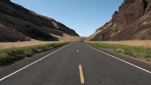 Static shot of lonely road into Devil's Canyon in Eastern Washington