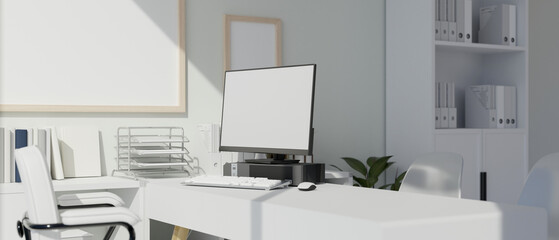 A modern white office with computer mockup on a table. doctor office, teacher room, front desk.