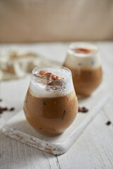 Iced cappuccino and milk foam