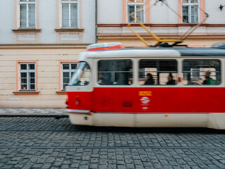 Naklejka na ściany i meble Old tram on the street of the old town in Prague.