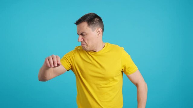 Man is ashamed that his armpit smells