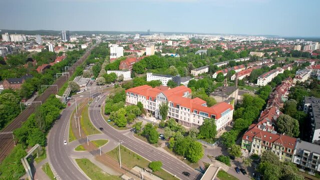 Aerial View Of Urban Sprawl In Gdansk On Sunny Clear Day. Dolly Back Shot