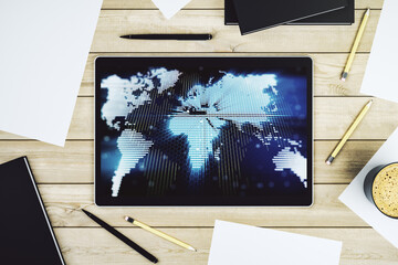 Abstract graphic world map on modern digital tablet screen, connection and communication concept. Top view. 3D Rendering