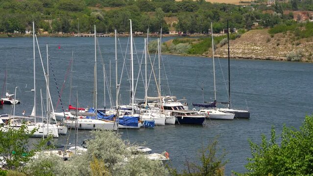 Ships and yachts vessels in Limanu Marina from Mangalia, Constanta 4k video. Seaside landscape in Romania, 2023.