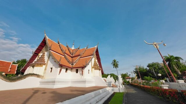 Experience the cultural heritage and peaceful ambiance in the serene beauty of Wat Phumin, Nan, Thailand. Witness the captivating sky in a mesmerizing time-lapse.