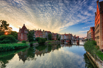 Fototapeta na wymiar The Main Town of Gdansk by the Motlawa river at sunset, Poland