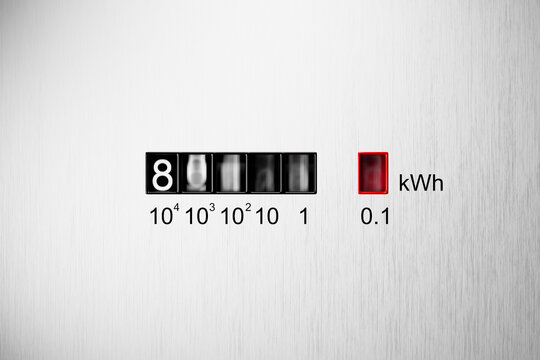 Close-up view of electrometer measuring electricity consumption. kWh counter.