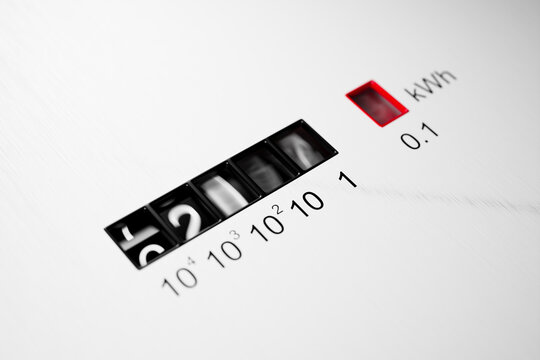 Close-up view of electrometer measuring electricity consumption. kWh counter.