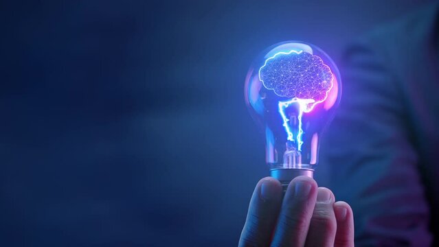 Businessman shows AI brain in glowing light bulb, Artificial intelligence, chat bot, machine learning concept, big data, cloud computing, computer network and futuristic innovation technology