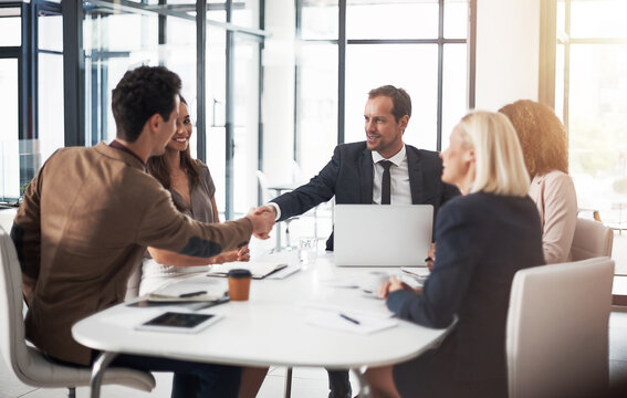 Business people, handshake and meeting for b2b deal, partnership or teamwork in office conference. Businessman shaking hands with employee in team building, planning or agreement in deal at workplace
