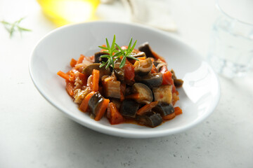 Traditional homemade vegetable ragout with fresh rosemary