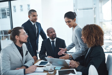 Business meeting, planning and people with laptop in discussion for ideas, strategy and collaboration. Corporate office, teamwork and men and women working on report, group project and proposal