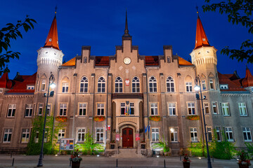 Obraz premium 2022-08-29. Night illumination of the 19th century Walbrzych Town Hall in neo-Gothic style, Lower Silesia. Walbrzych, Poland