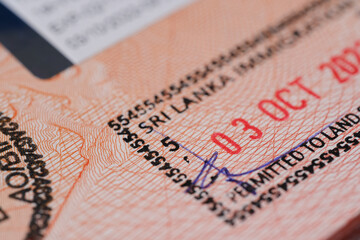 close-up part of page of document, foreign passport for travel with Sri Lanka visa, tourist visa...