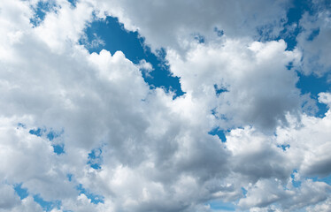 Obraz premium Blue sky with cumulus clouds during summer. Wheater, meteorology, atmosphere and overcast.