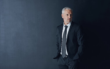 Senior executive, business man and confidence in studio, management and professional mindset on...