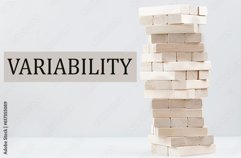 Poster variability text with wooden block stack on white background , business concept