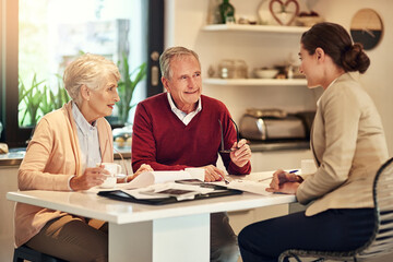 Senior couple, financial advisor and documents for retirement plan, budget or expenses and bills at home. Elderly man and woman in finance discussion with consultant or lawyer for paperwork or loan