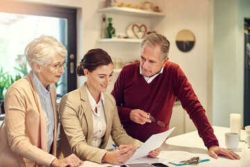 Senior couple, accountant and documents in finance, budget or agreement for consultation at home....