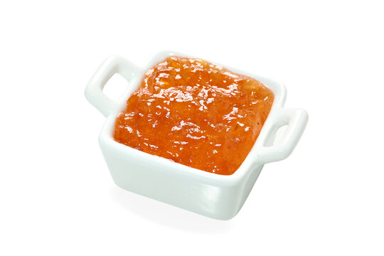 pepper jelly (Pimenta dedo de Mo&ccedil;a), malageta pepper jelly, sweet and sour red pepper jelly, on white background with selective focus, on white porcelain