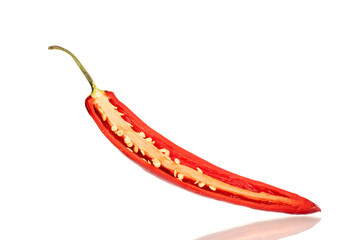 One half pod of hot red pepper, macro, isolated on white background.