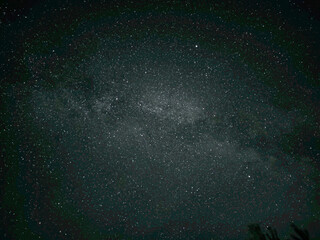 Photo of the starry sky. Summer spring Triangle of bright stars Vega alpha Lyra, Deneb alpha Cygnus and Altair alpha Eagle.