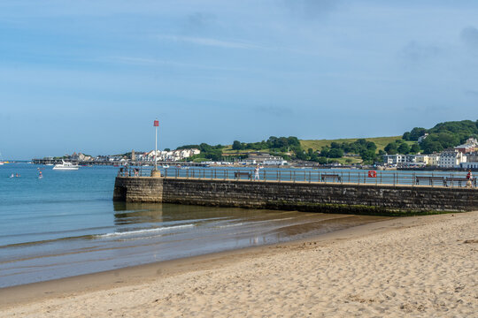 The sandy Swanage Beach with the Banjo Pier, - Swanage, UK