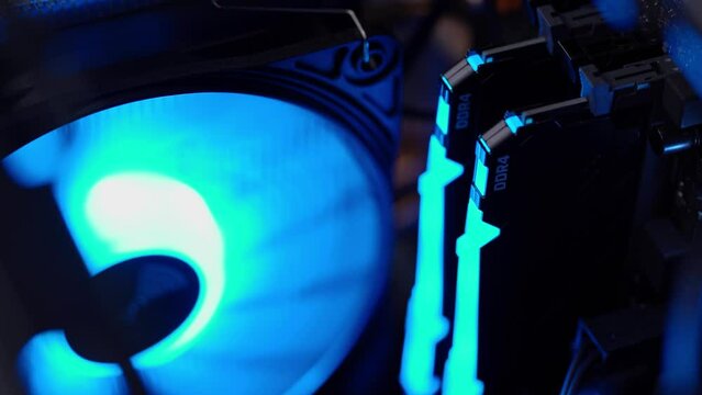 Dnieper. Ukraine 11.05.2023: Computer fan. DDR4. Modern case cooling system. Installation of HTPC, Hackintosh PC and Gaming PC with liquid cooling system and full ARGB lighting inside