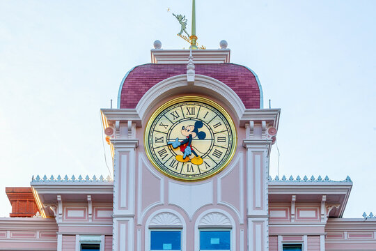 Mickey mouse clock tops the hotel at the Disneyland park entrance.