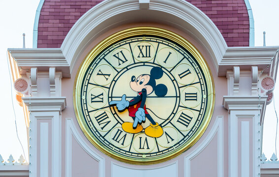 Mickey mouse clock tops the hotel at the Disneyland park entrance.