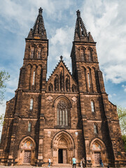 Fototapeta na wymiar Prague, Czech Republic - 05 12 2023: Facade of Basilica of St. Peter and St. Paul in Prague