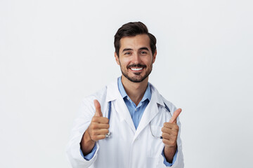 man doctor in a white coat with a stethoscope and wearing glasses for a smile hands up victory and happiness on a white isolated background looking into the camera, copy space, space for text, health