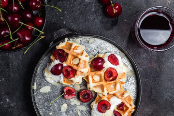Belgian sweet waffles with cream cheese and cherries