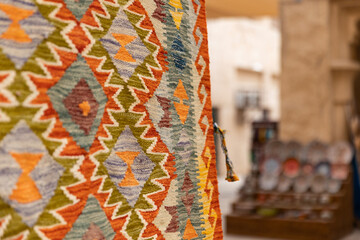 Dubai, Al Fahidi, April 2023 - Colorful oriental carpet, traditional arabic design.