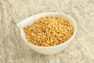 Crunched roasted peanut in the bowl