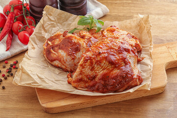 Marinated chicken leg in tomato sauce