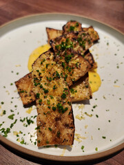 Family special day celebration. Father's Day Dinner. European and Asian fusion food cooked over wood and charcoal fired grill that gives an aromatic flavours