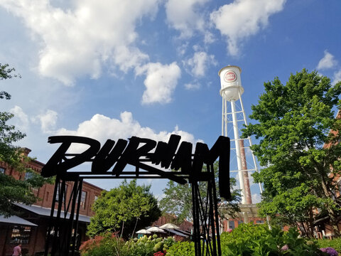 Durham, NC - USA - 6-25-2023: American Tobacco complex in downtown Durham, which includes restuarants and businesses in renovated tobacco warehouses