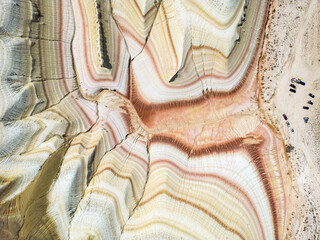 Kyzylkup Valley and so called Tiramisu Hills in Mangystau of Kazakhstan. The rock formations are in an ancient sea bed. Aerial drone photography.