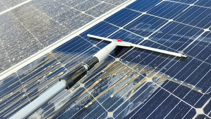 Cleaning dirty solar panels. Maintenance