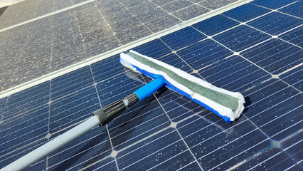 Cleaning dirty solar panels. Maintenance