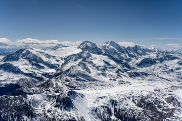 Fototapeta na wymiar Bianco lake at Bernina pass, aerial from east, Switzerland