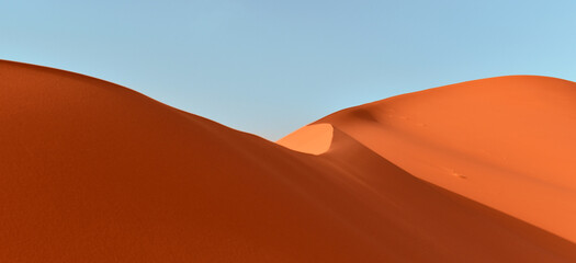 Fototapeta na wymiar Sand dunes in the Sahara Desert, Algerian part in the Tadrart and Tassili n'Ajjer mountains, Africa
