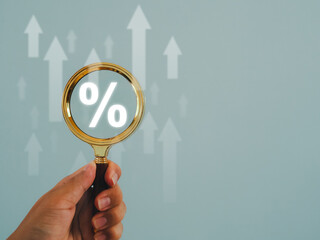magnifying glass with percentage sign and up arrow icon Increased interest and dividends from...
