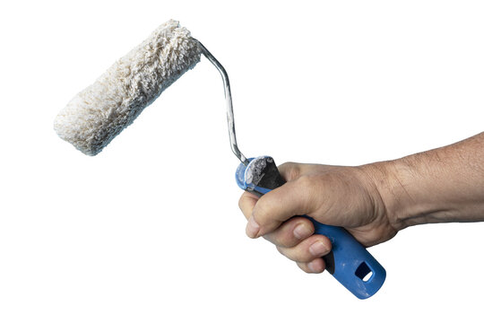 a roller brush in hand